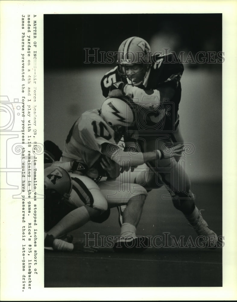1986 Press Photo Rice's James Phorne stops Air Force's Jim Tomallo short of goal- Historic Images