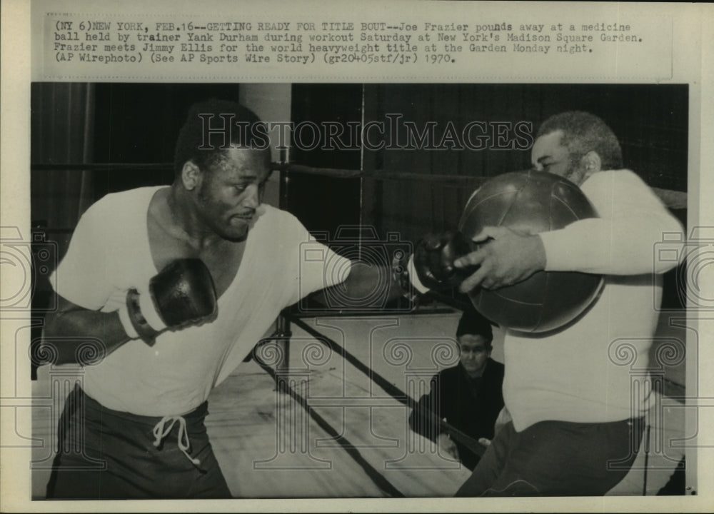 1970 Boxer Joe Frazier works out with trainer Yank Durham in NY. - Historic Images