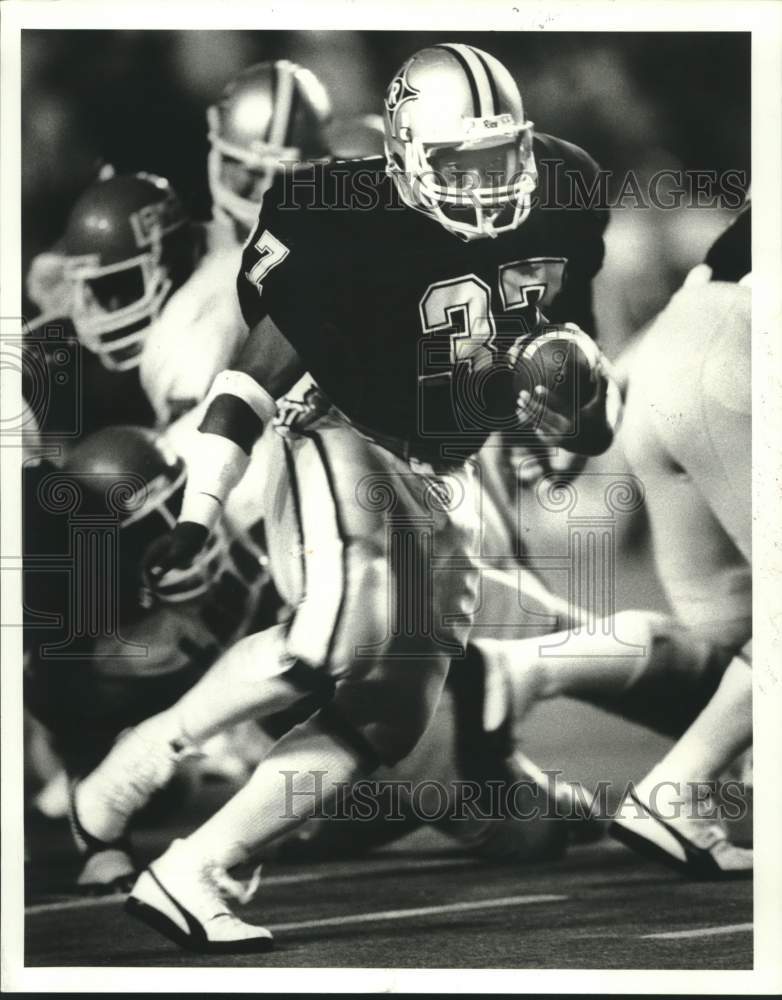 1985 Press Photo Rice&#39;s running back Antonio Brinkley rushes against Lamar- Historic Images