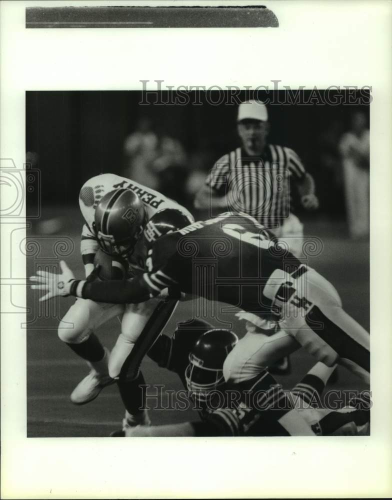 1987 Baylor&#39;s Charles Perry is stopped by Houston&#39;s Robert Jones. - Historic Images