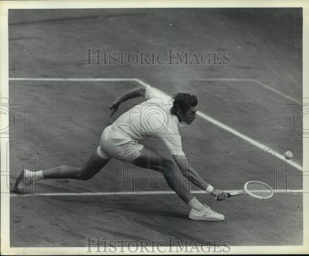 1974 Tennis player Onny Parun misses ball in tennis match - Historic Images