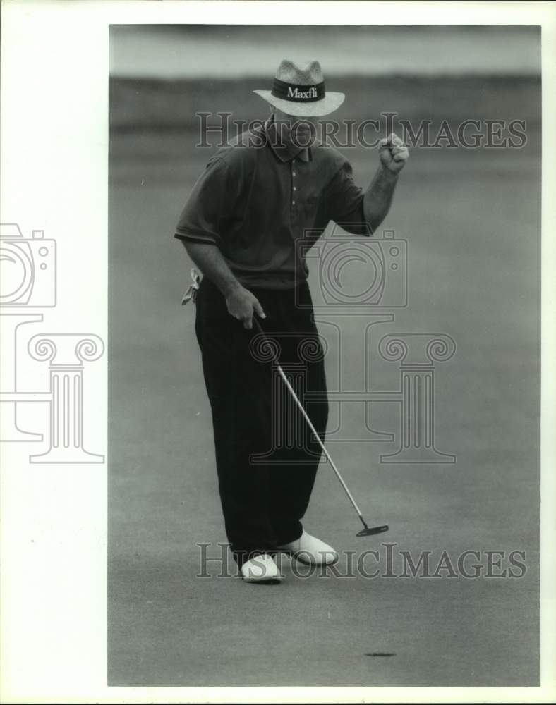 1993 Golfer Blaine McCallister celebrates after sinking a birdie, TX - Historic Images