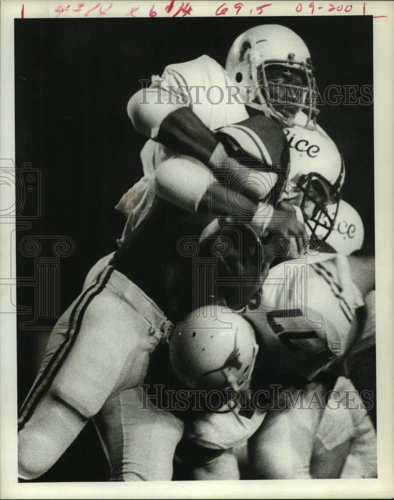 1976 Rice University football player tries to get by defense-Houston - Historic Images