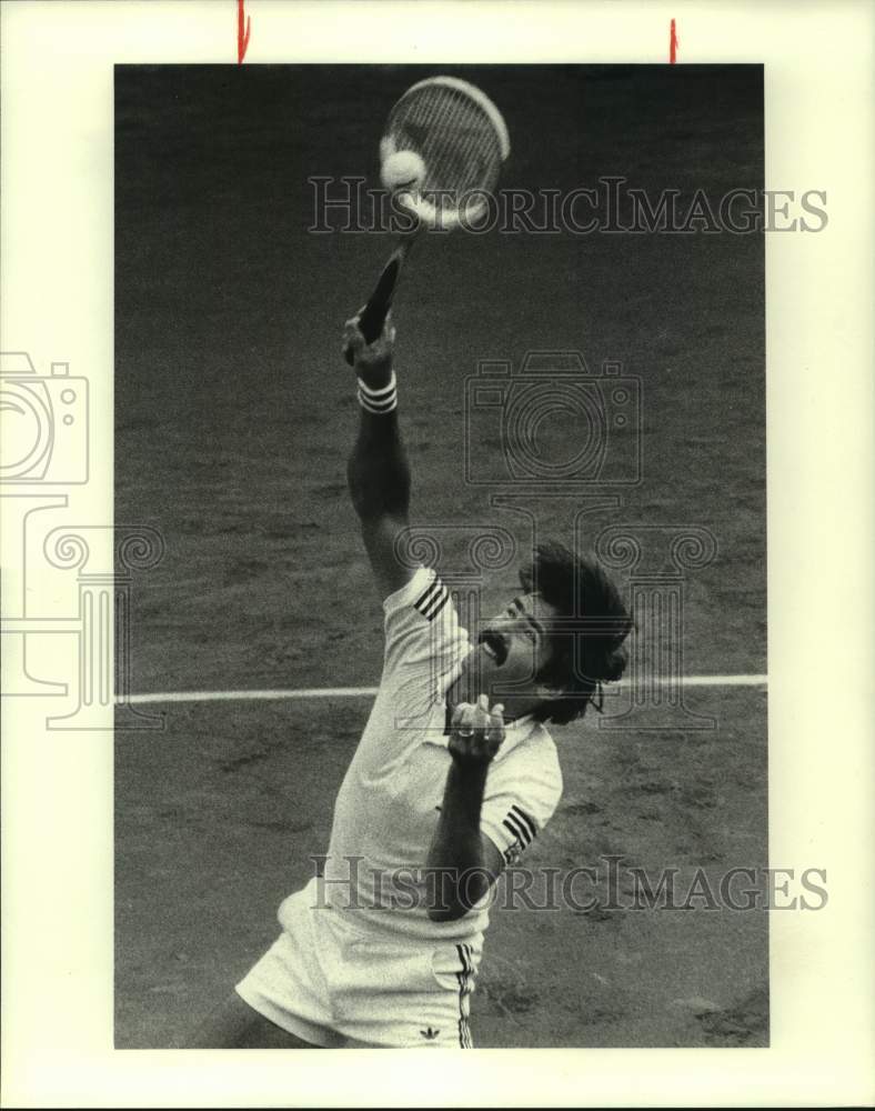 1980 Tennis player Marty Riessen serves the ball - Historic Images