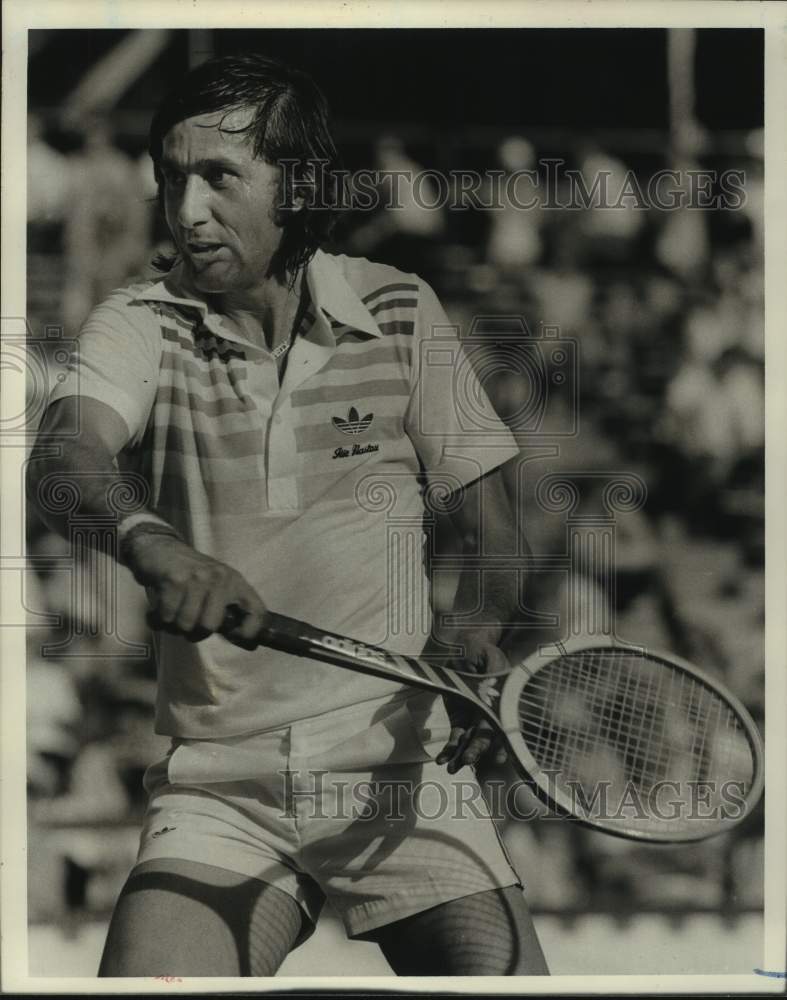 1988 Tennis player Ilie Nastase in tournament at Forest Hills, NY - Historic Images