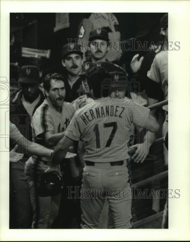 1976 Mets' Keith Hernandez is congratulated by team for scoring run. - Historic Images