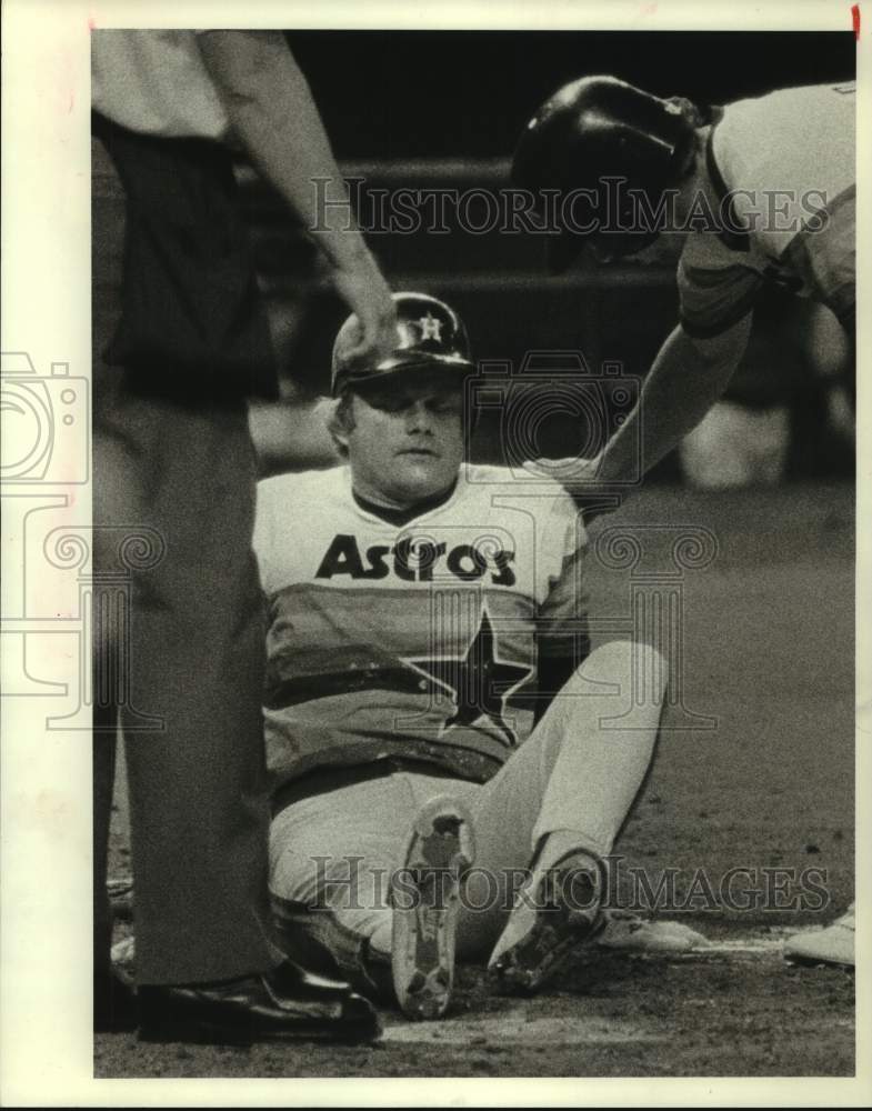 1983 Astros' Joe Niekro in pain after he fouls ball off leg. - Historic Images
