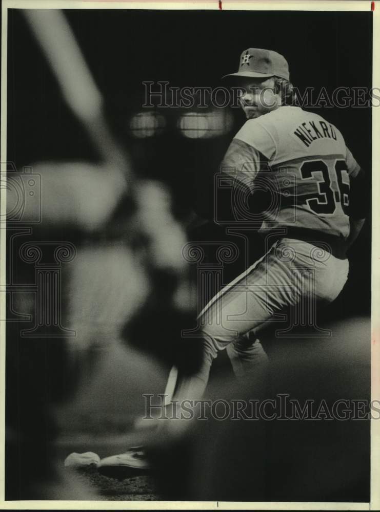 1981 Astros' pitcher Joe Niekro readies throw to plate during win. - Historic Images