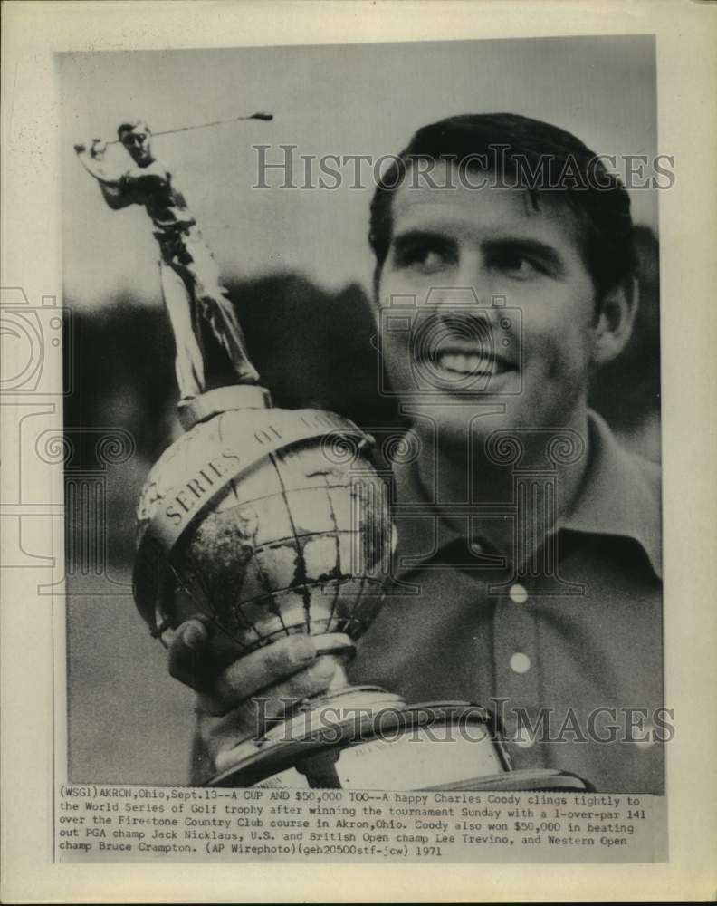 1971 Charles Coody wins World Series of Golf trophy in Akron, Ohio - Historic Images