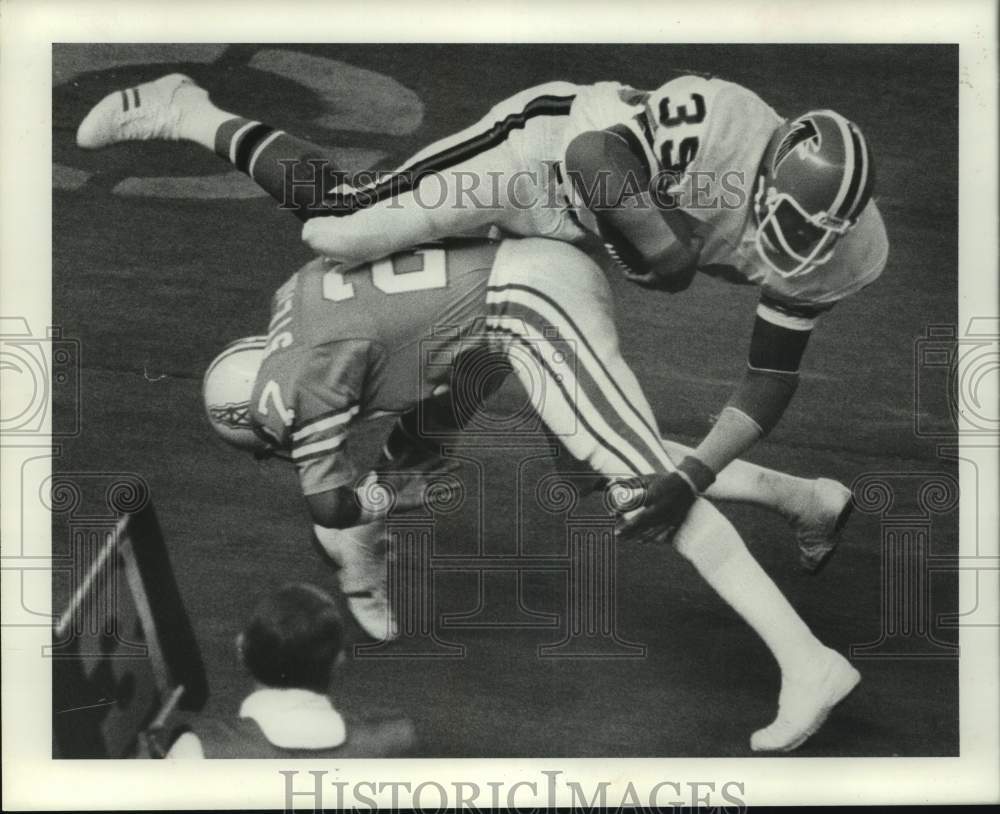 1976 Houston Oilers' Greg Stemrick tackles opposing team's Pritchett - Historic Images