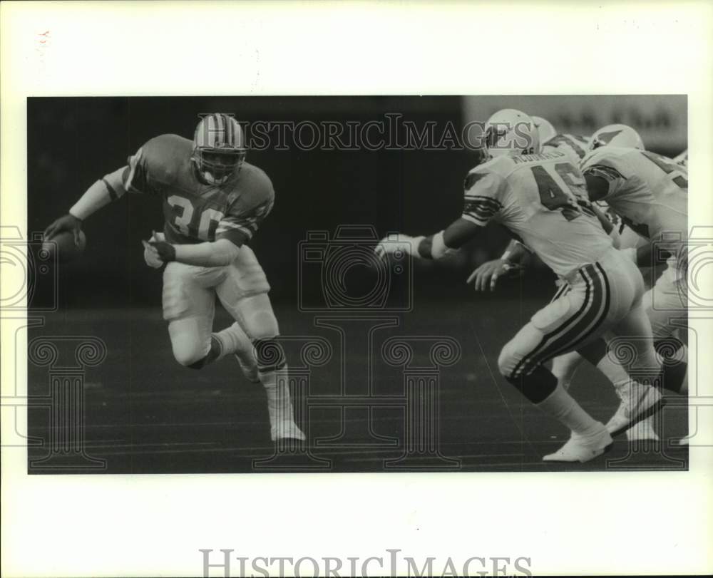 1988 Press Photo Mike Rozier evades three cardinals. - hcs15704- Historic Images