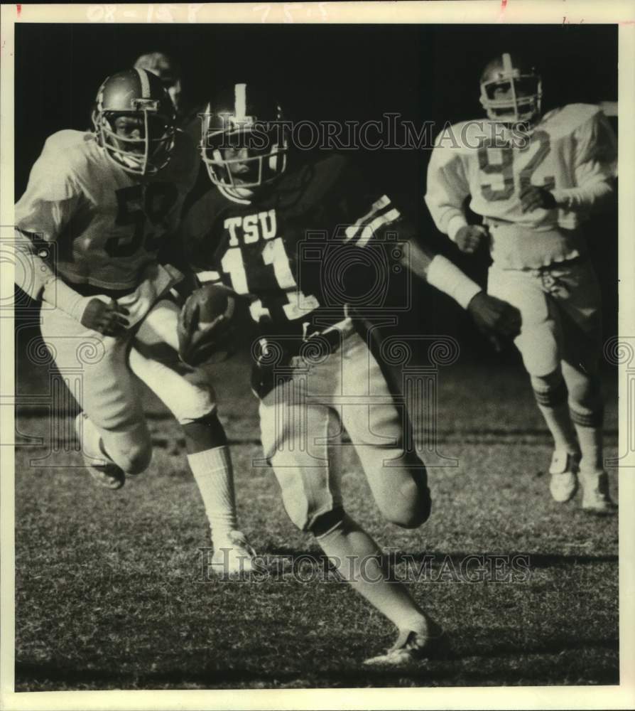 1981 Footballs' Vincent Pleasant, Michael Rhodes, Kelvin Wallace-TX - Historic Images