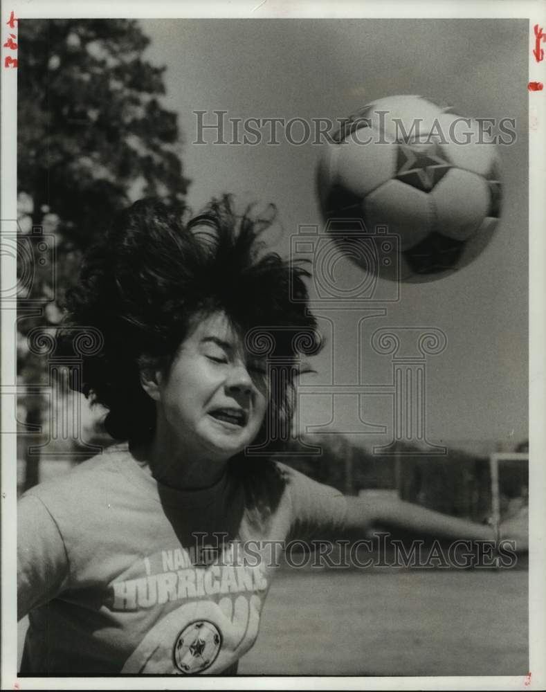 1978 Lin hits soccer ball with her head to pass in game, Houston-TX - Historic Images