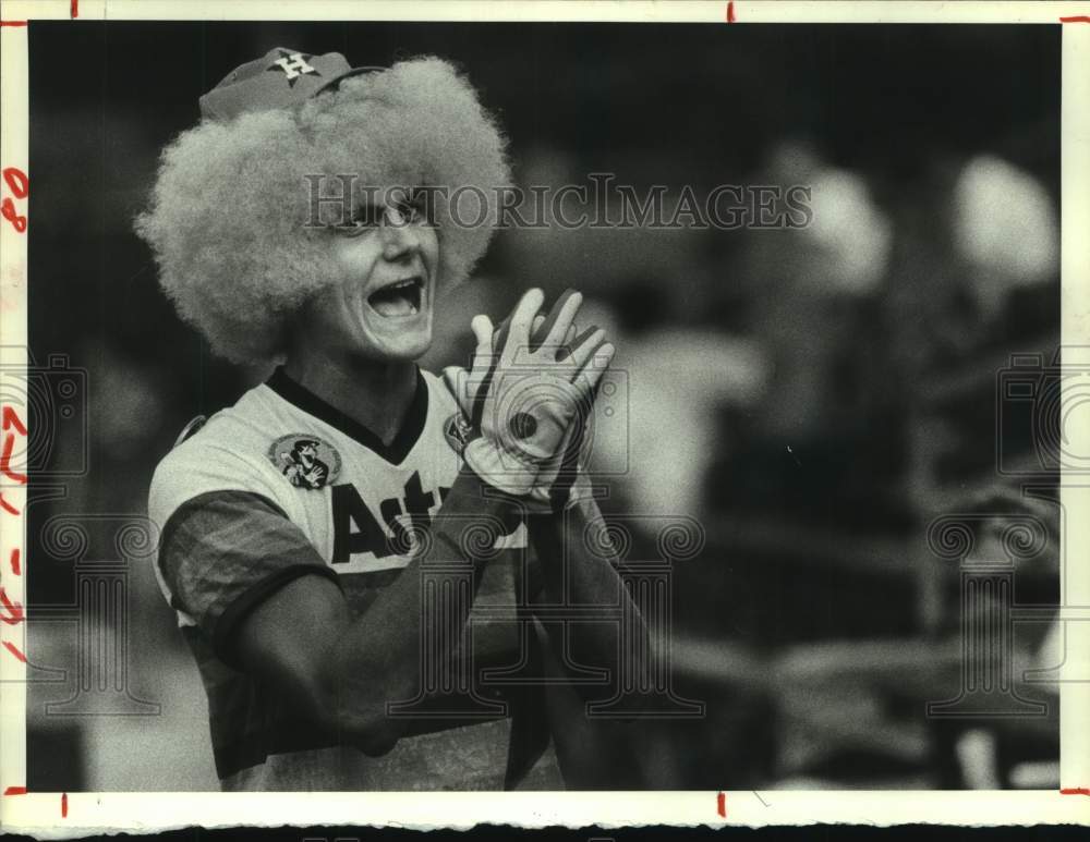 1981 &quot;Batty&quot; Bob Robertson cheers at Women&#39;s Softball Tournament - Historic Images