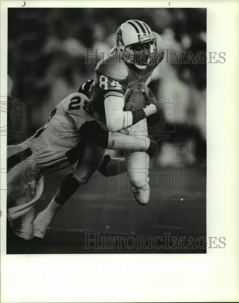 1990 Press Photo Oilers Haywood Jeffires drags Giants Everson Walls after catch. - Historic Images