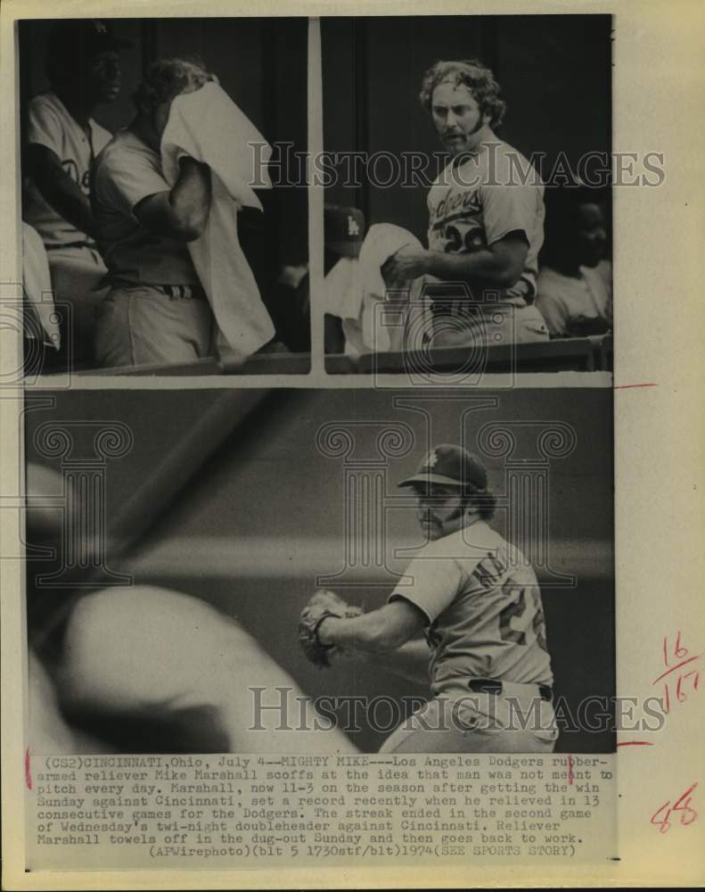 1974 Press Photo Dodgers workhorse reliever Mike Marshall pitches to Reds. - Historic Images