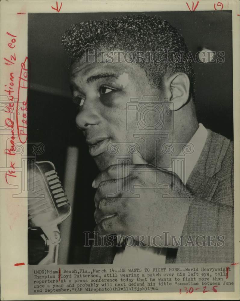 1961 Press Photo Boxer Floyd Patterson talks to reporters in Miami Beach, FL- Historic Images