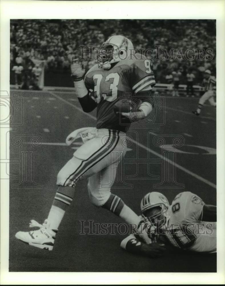 1989 Press Photo Houston Oilers football player Robert Lyles runs back pick- Historic Images