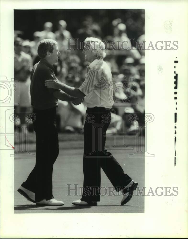 1988 Press Photo Golfers Greg Norman, right, and Curtis Strange - hcs20345 - Historic Images