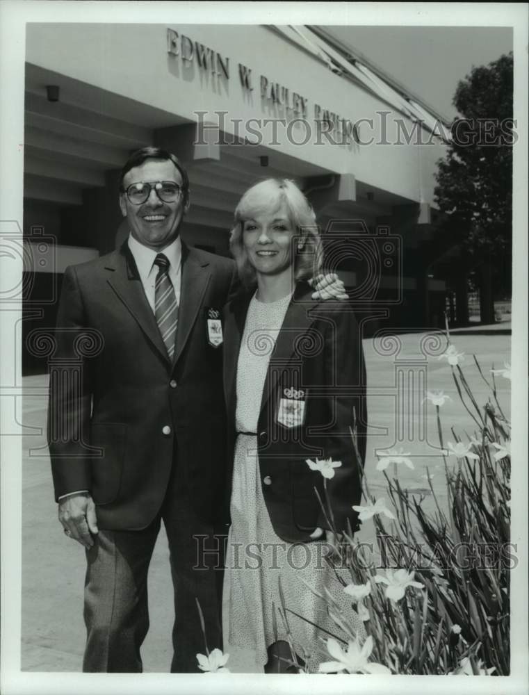 1988 Press Photo Gymnast Cathy Rigby outside UCLA's Pauley Pavilion with co-host - Historic Images