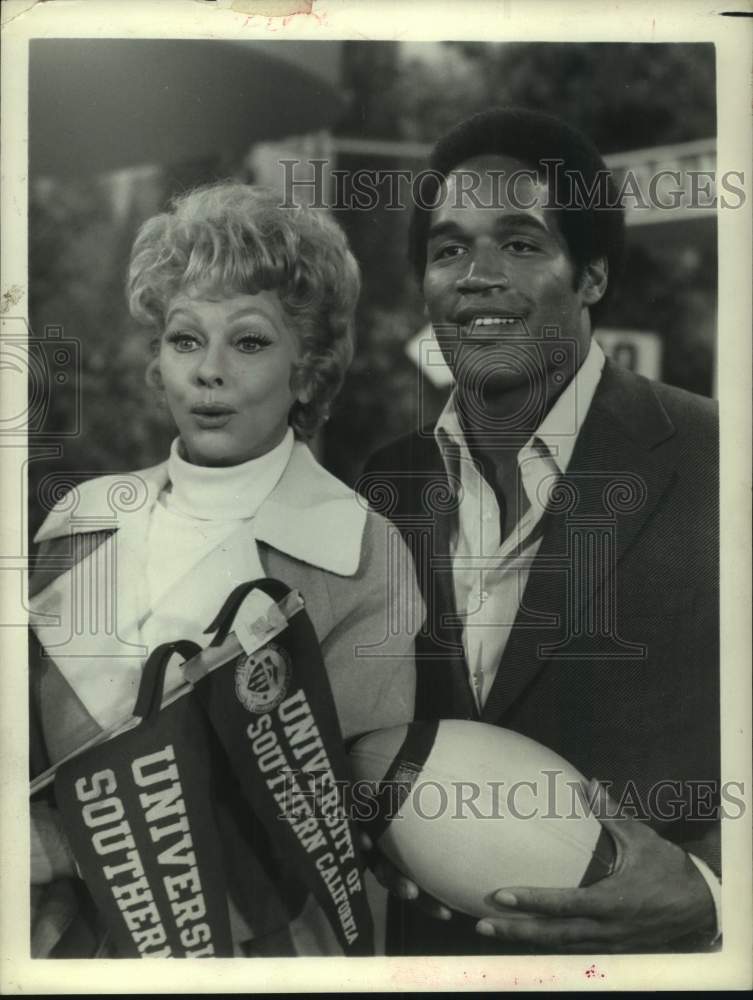 1973 Press Photo Actress Lucille Ball & football player O.J. Simpson - hcs23248- Historic Images