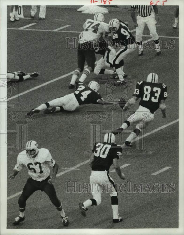 1977 Press Photo Texas A&amp;M football player Jimmy Rhodes in action - hcs23536 - Historic Images