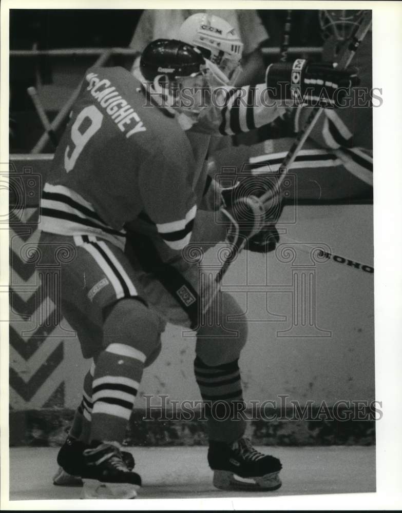 1986 Press Photo Brad McCaughey and Eric Weinrich at Hockey Game in Houston- Historic Images