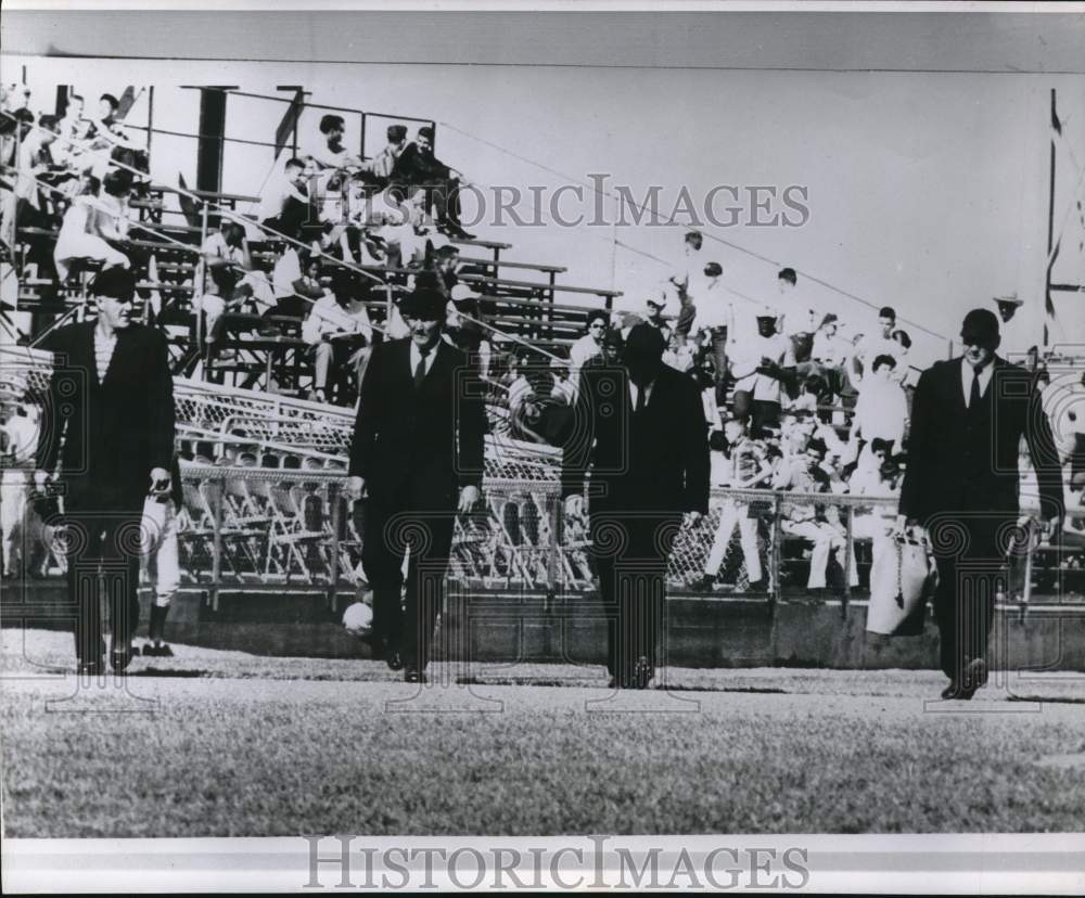 1962 Press Photo Referees Walking on Baseball Field for Colts Game - hcs28386 - Historic Images