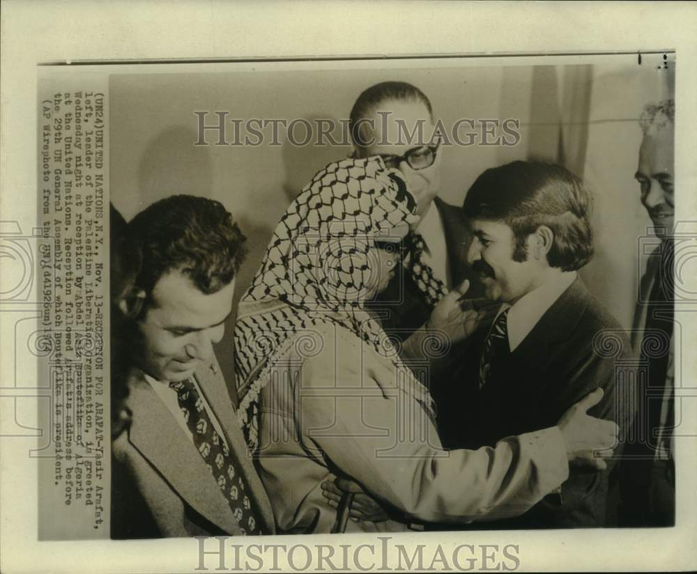 1974 Press Photo Yasir Arafat attends reception by Algeria after UN speech. - Historic Images