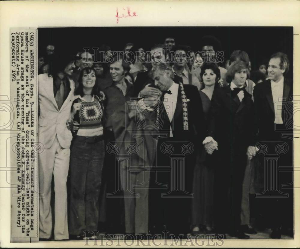 1971 Washington-Leonard Bernstein hugs cast members of his "Mass" - Historic Images