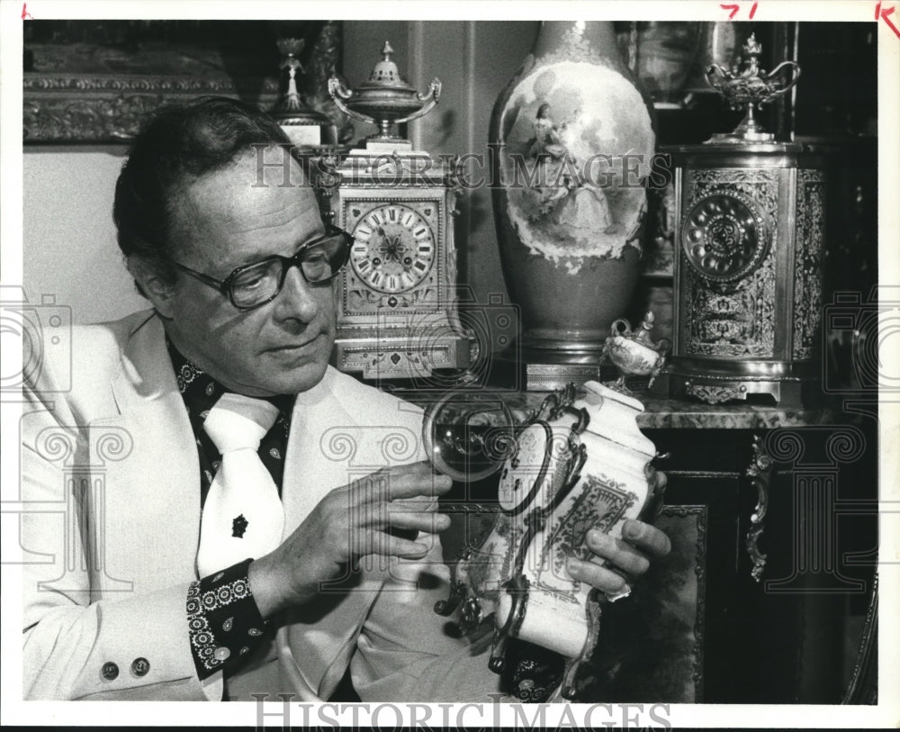 1977 Antique Collector Shows off Old Clock - Historic Images