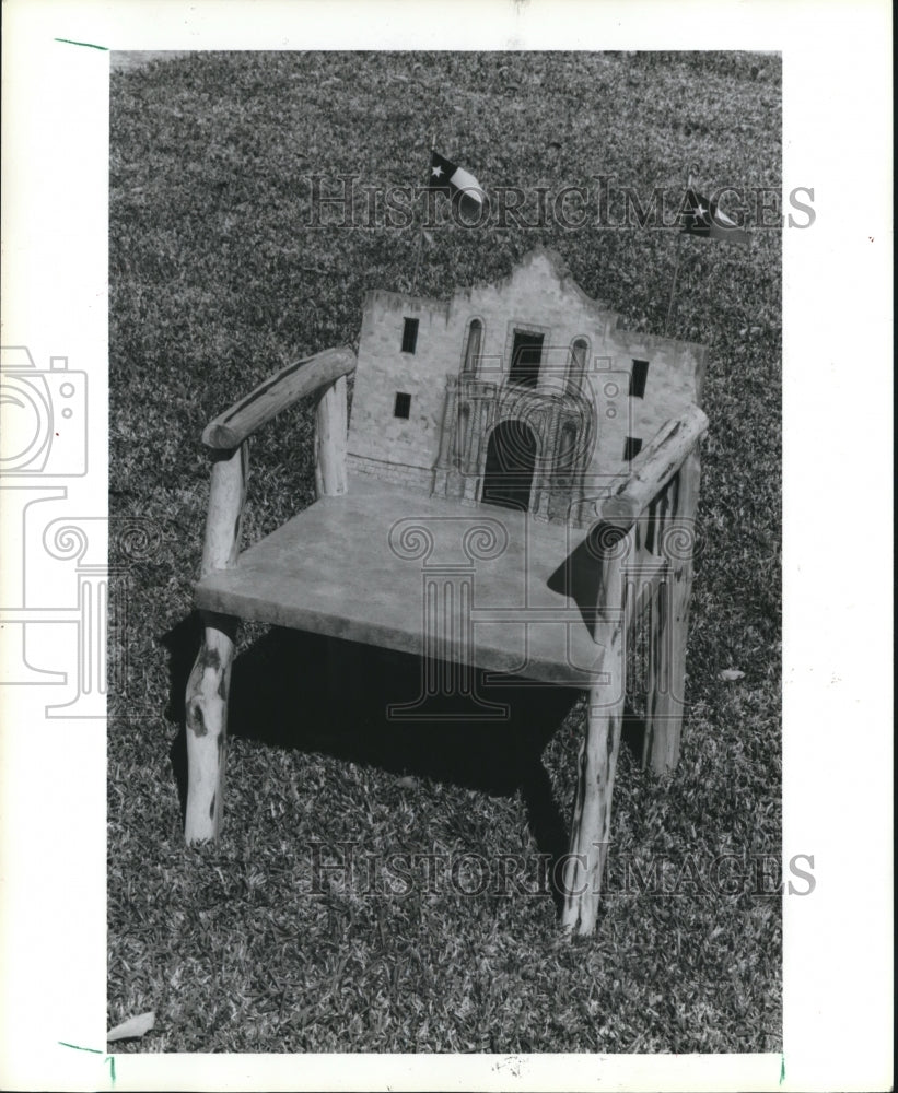 1986 Adam St. John calls his chair &quot;Remember the Alamo.&quot; - Historic Images