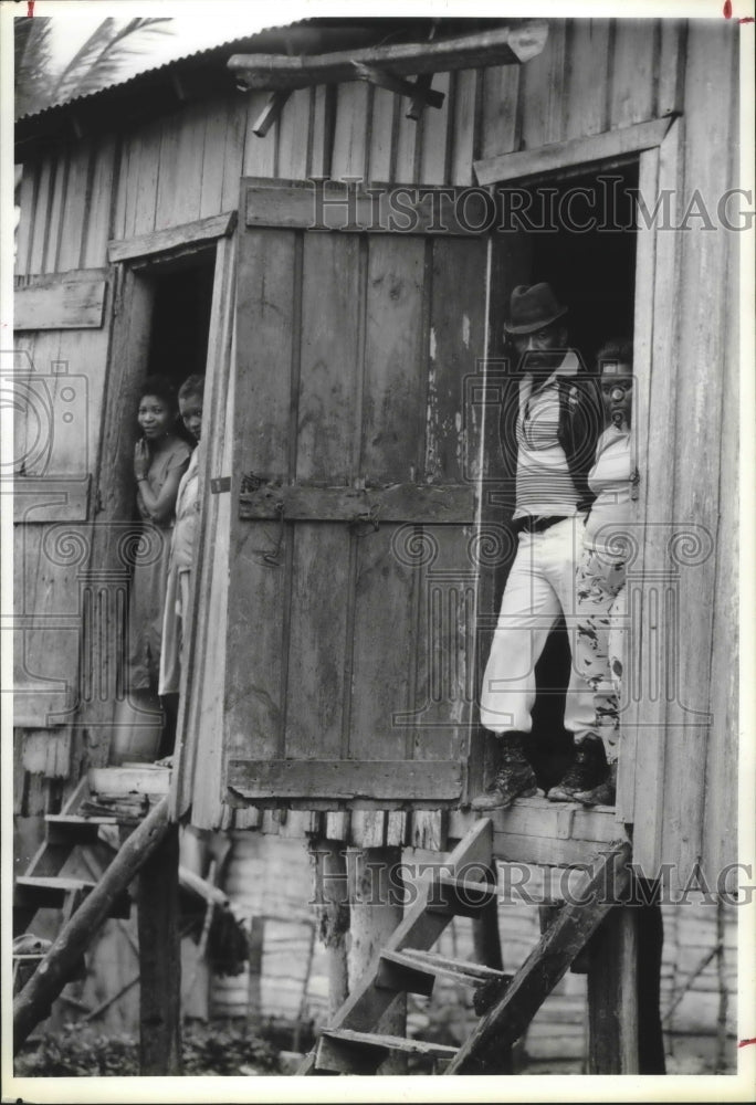 1990 Workers on Haina Plantation in the Dominican Republic in Door - Historic Images