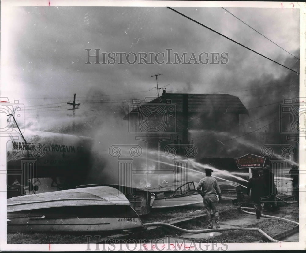 1963 Houston Firemen Pour Water on White Oak Service Station. - Historic Images