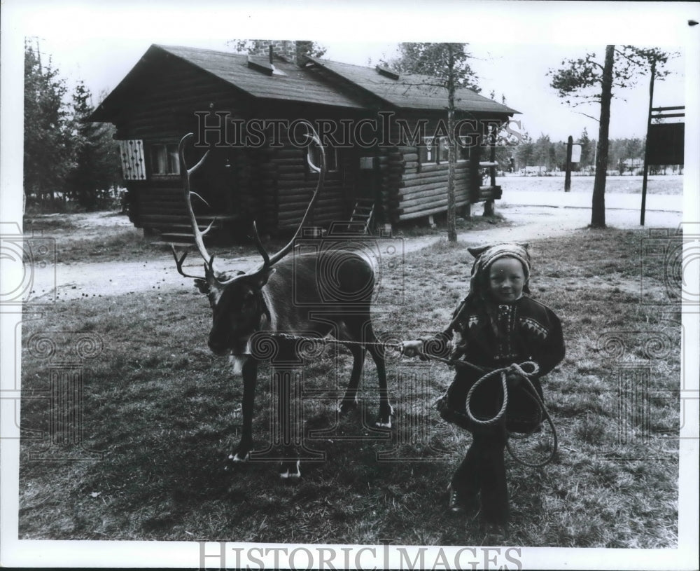 1982 A little Boy and His Reindeer in Lapland, Finland. - Historic Images