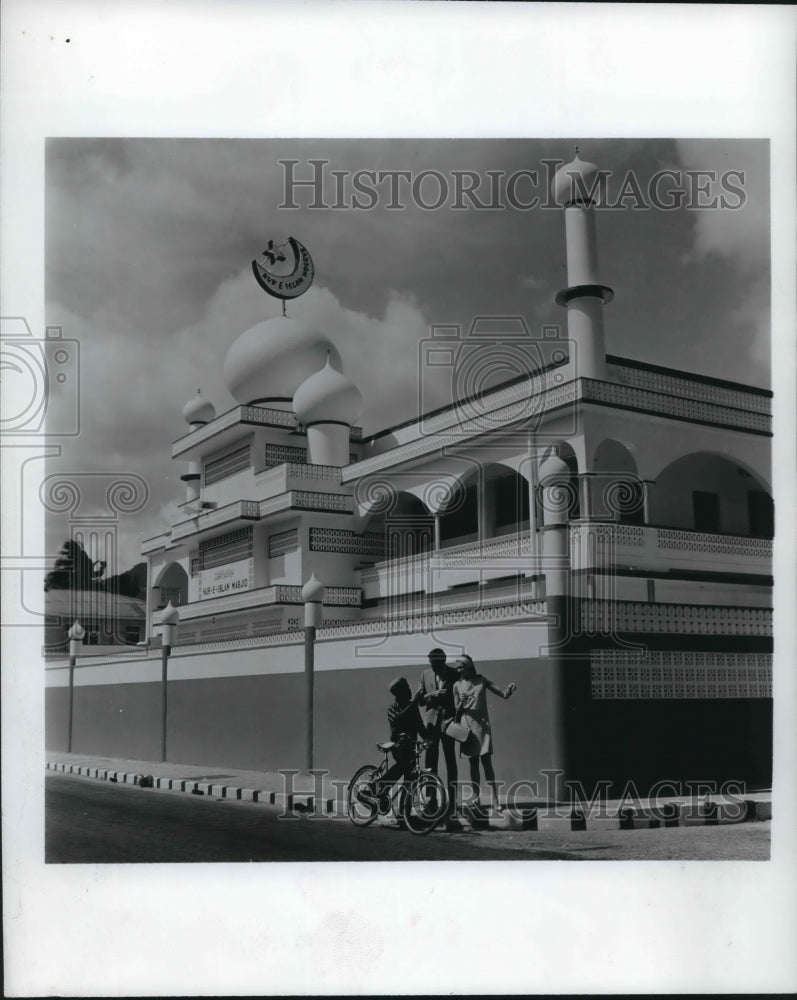 1970 Couple Talks With Child on Bike in Trinidad. - Historic Images