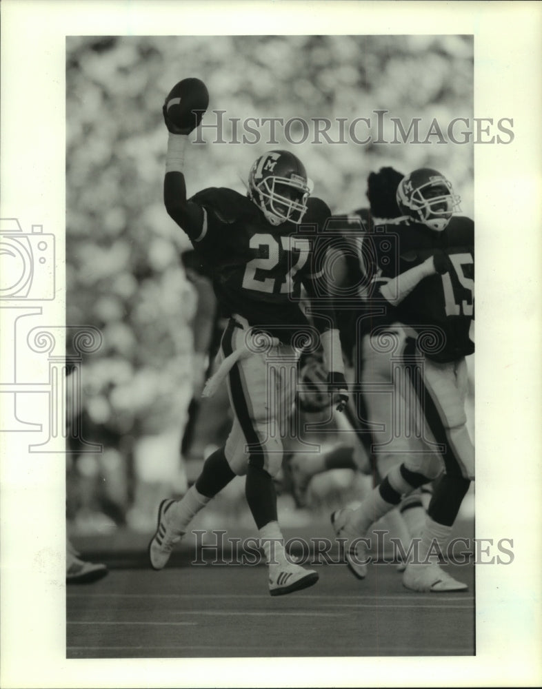 1988 Texas A&amp;M Football Player Chet Brooks Holds Ball High. - Historic Images