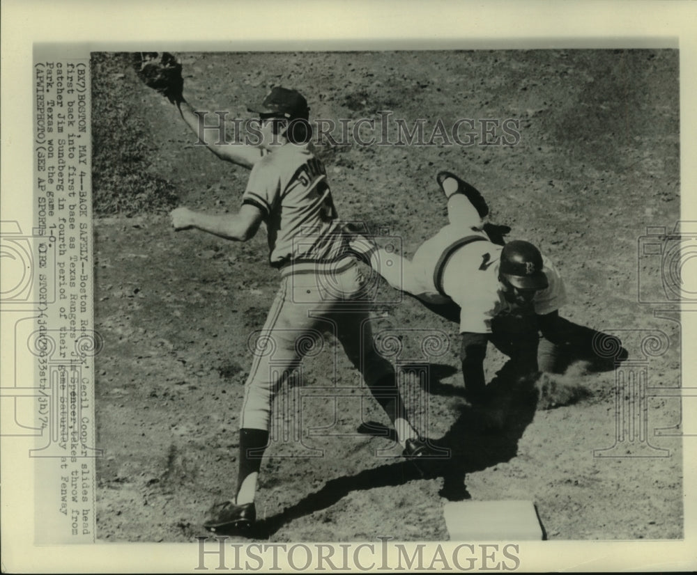 1974 Boston Red Sox Cecil Cooper Slides to first base - Historic Images