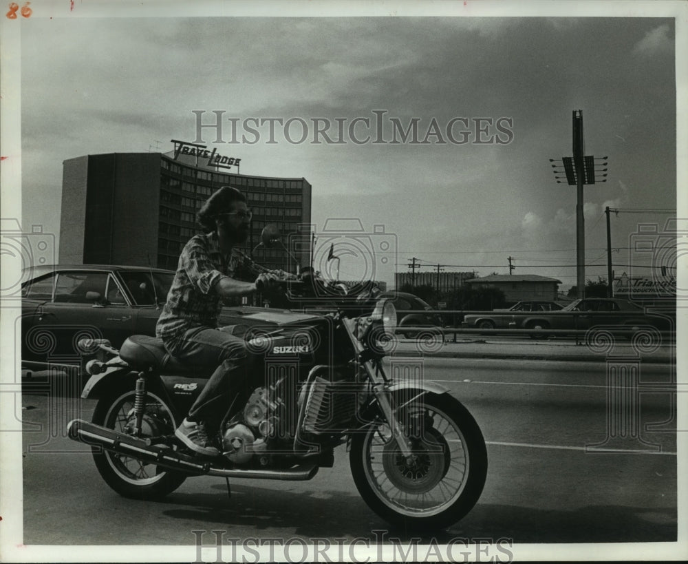 1977 Unidentified Motorcyclist on Southwest Freeway Without Helmet. - Historic Images