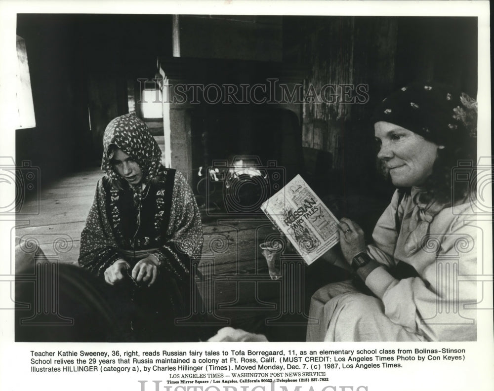 1987 Teacher reads Russian fairy tales to students at Ft. Ross,CA. - Historic Images