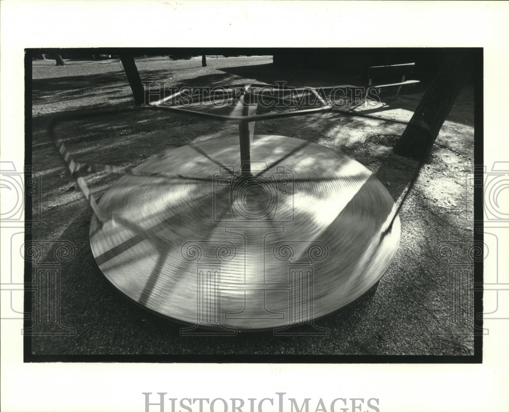 1987 Playground Equipment Spins in Houston, Texas Park - Historic Images