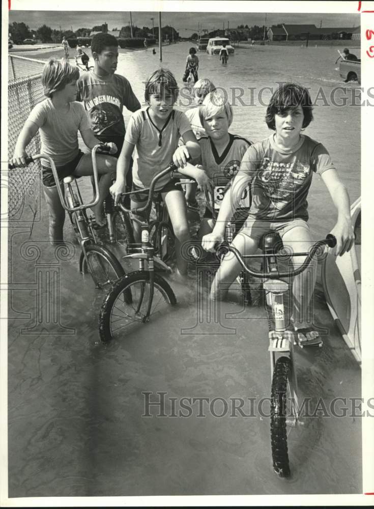 1979 Bikers Ride Through Floodwaters, Sagemeont Area, Houston, Texas - Historic Images