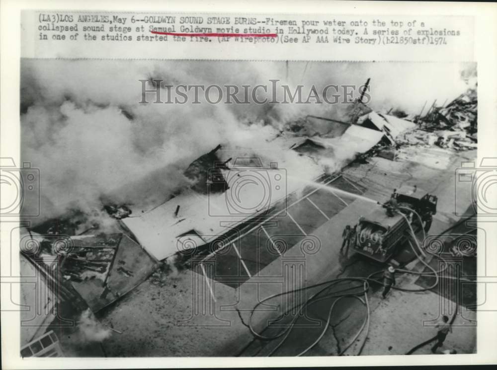 1974 Press Photo Firemen Pour Water on Burning Goldwyn Studios in Hollywood - Historic Images