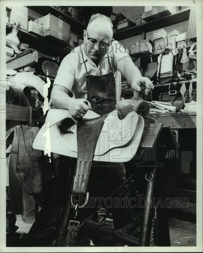 1962 Saddle maker W.D. Decker at Stelzig&#39;s store in Houston-Historic Images