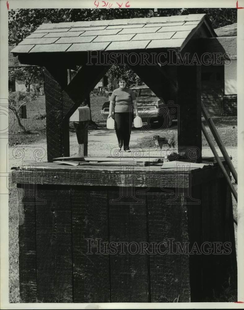 1975 Joyce Keith Makes Hauls Water in Spring Branch Acres, Houston - Historic Images