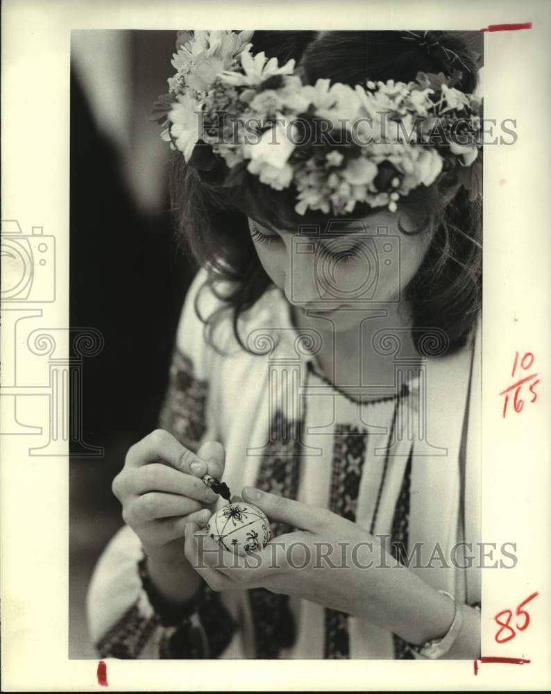 1982 Spring Woods High student Lori Serrera paints Ukrainian Easter - Historic Images