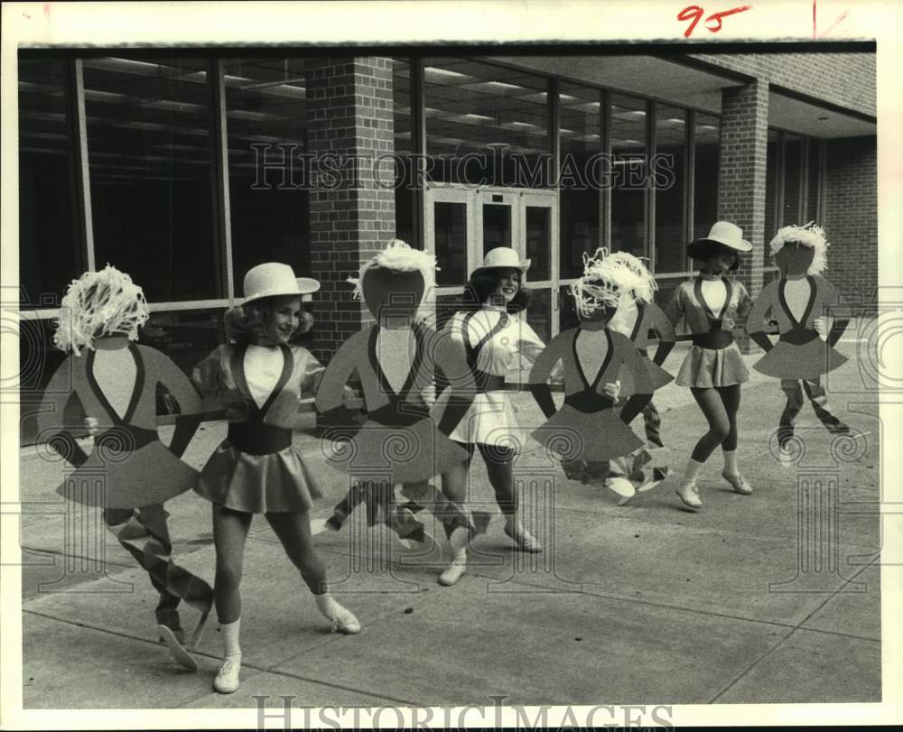 1980 Press Photo Stratford High Spartanaires hold cutouts in Houston, Texas - Historic Images