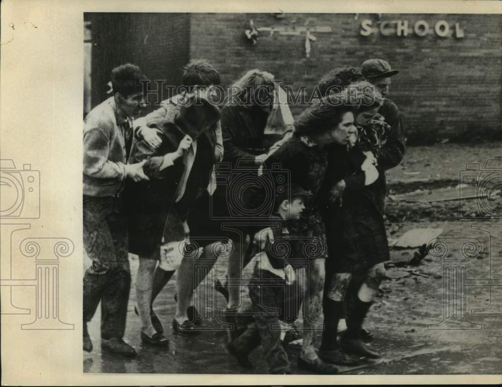 1967 Parents lead children from Belvidere High in Illinois - Historic Images