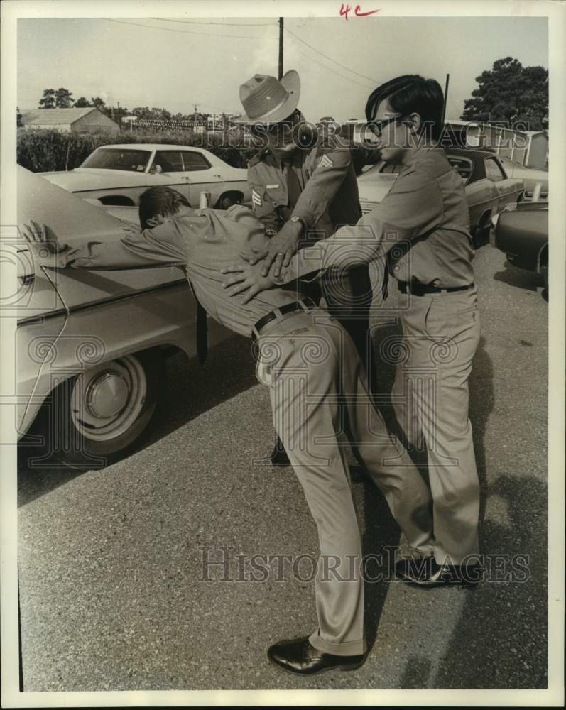 1972 Sergeant John J. Cizek Instructs David Galloway in Search - Historic Images