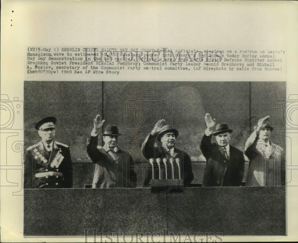 1969 Soviet officials wave to crowd - May Day event in Red Square - Historic Images